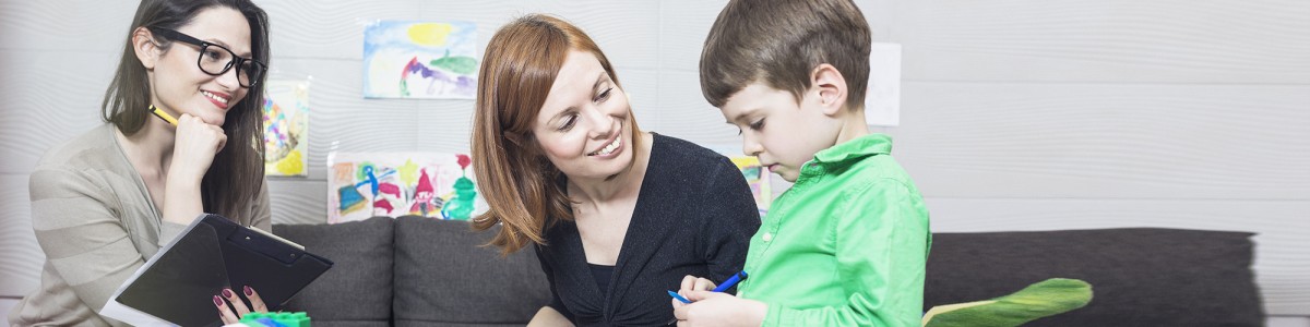 Mental health therapist works with a parent and child