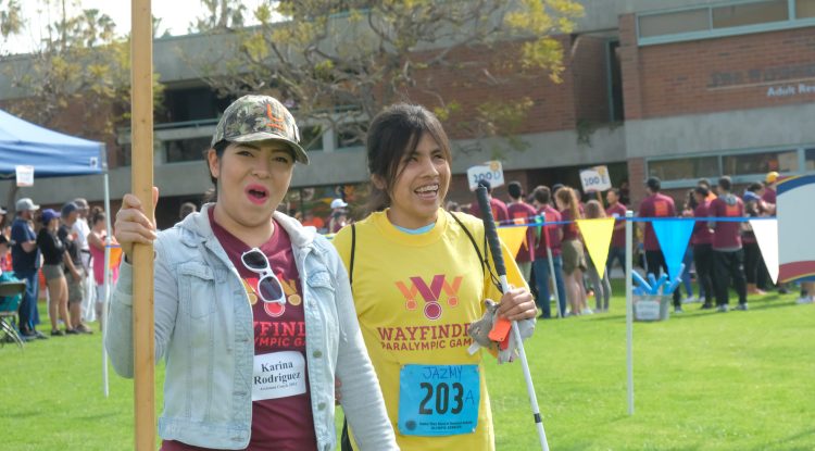 volunteer and athlete at opening ceremonies