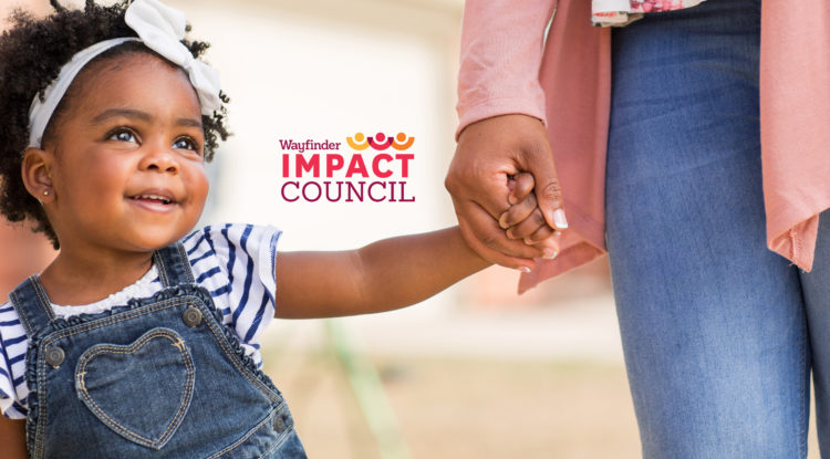toddler holding adult hand with Impact Council Wayfinder Logo on photo