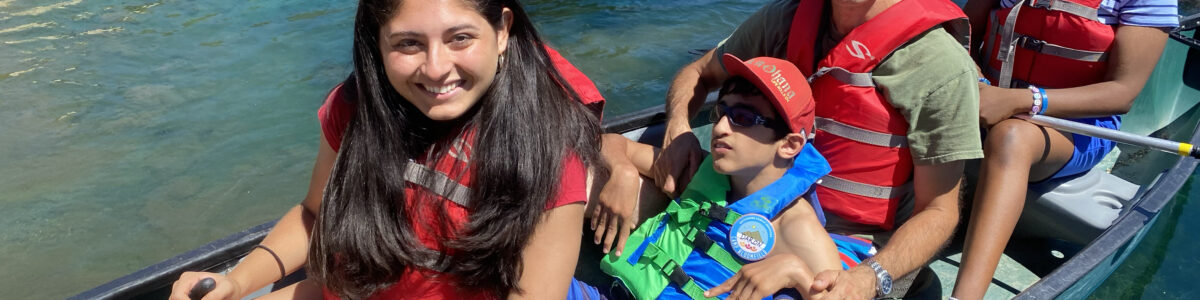 Camper's canoeing at camp at camp Bloomfield