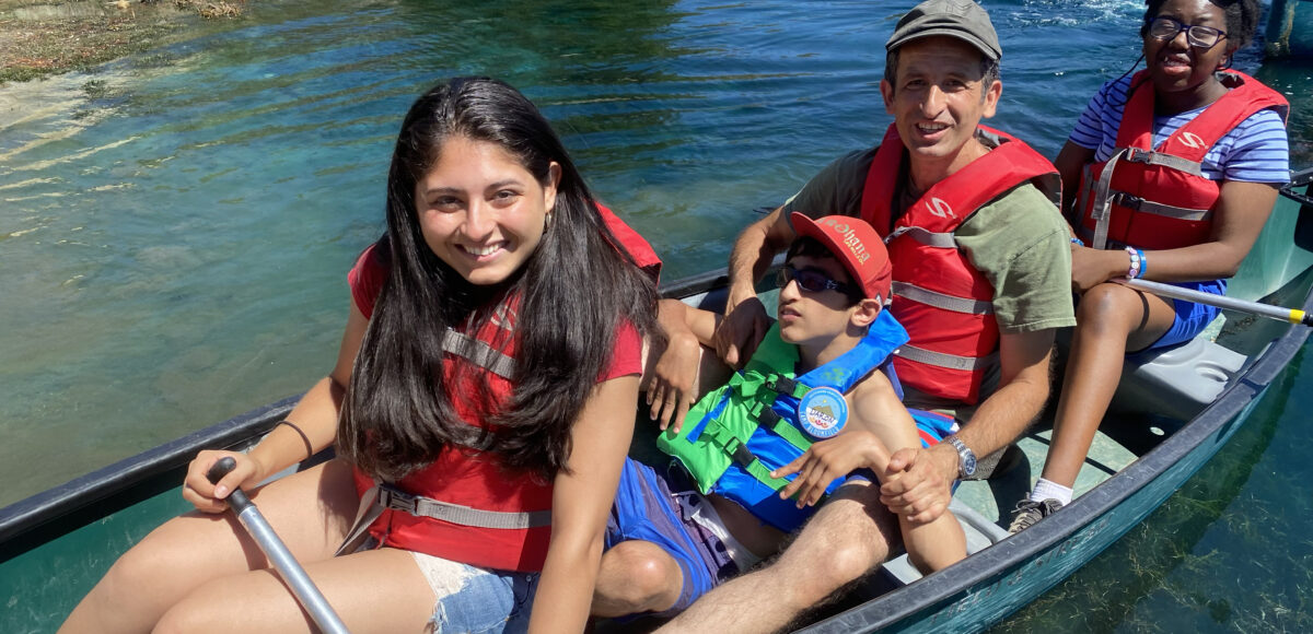 Camper's canoeing at camp at camp Bloomfield