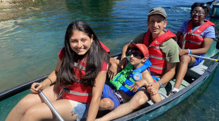 Camper's canoeing at camp at camp Bloomfield